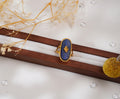 Bague ovale en pierre bleue et acier inoxydable – Élégance vintage & éclat raffiné