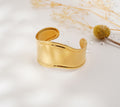 Bracelet doré à courbes fluides en acier inoxydable – Élégance sculpturale & raffinement moderne