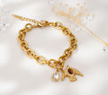 Bracelet doré à pendentif oiseau en acier inoxydable – Élégance