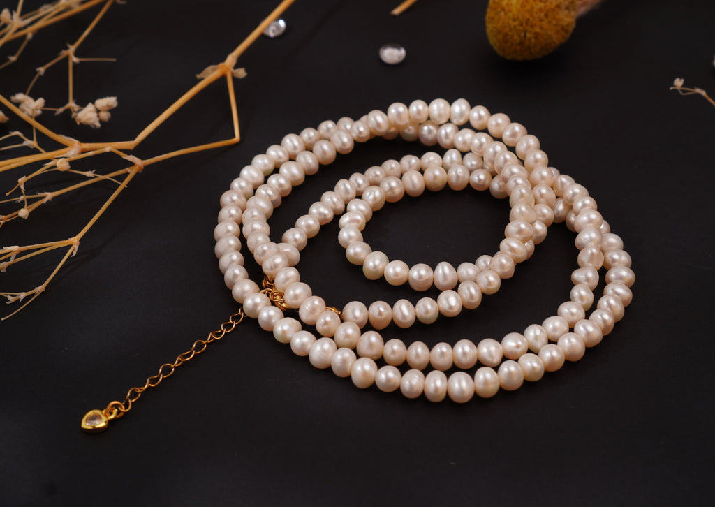 Collier long perles naturelles – Style raffiné & artisanal