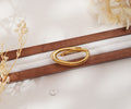 Bague dorée design fluide en acier inoxydable – Élégance sculpturale